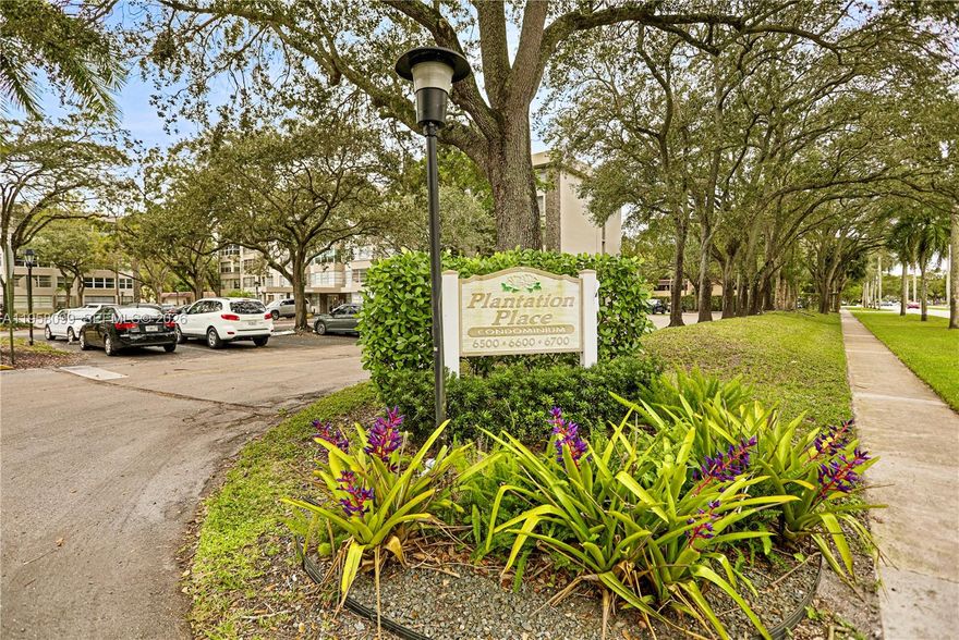 Beautifully remodeled 2-bedroom, 2-bath first-floor condo offering comfort, natural light, and exceptional value in the heart of Plantation. This spacious residence in iconic Plantation Place Condo, features neutral tile flooring throughout, an extended living area filled with natural light, a designated dining space, and a stylish remodeled kitchen with stainless steel appliances and ample cabinetry. The split floor plan offers privacy, with a generous primary suite featuring a remodeled en-suite bath with dual sinks, private shower area, a walk-in closet plus additional storage, plus an updated guest bathroom. Secure building access and excellent storage throughout. Includes 1 assigned parking plus guest parking, a laundry room just steps away, bike storage, pool, clubhouse, and security. Pets under 20 lbs allowed. Rental restrictions apply, supporting long-term value. Ideal for families starting out or investors seeking a stable long-term investment, as the community offers an ideal lifestyle close to parks, shopping, dining, and major highways. A turnkey opportunity, contact listing agent and schedule your private showing today.