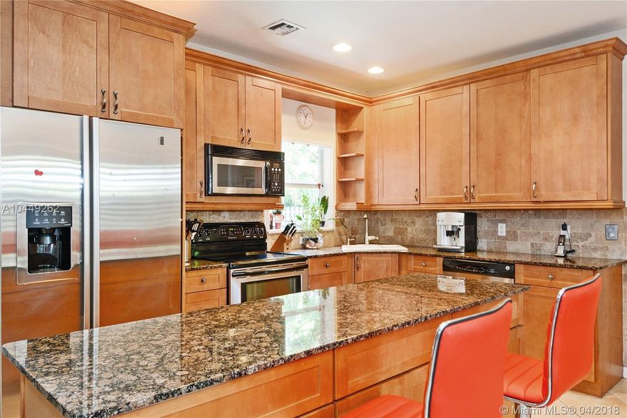 Amazing 3 bedroom 3 bathroom home in the desirable community of Victoria Village. Spacious living areas are perfect for entertaining. Countless features include impact windows and doors throughout, plantation shutters, updated kitchen with granite and Travertine backsplash , tile throughout and more! Open kitchen features stainless steel appliances, wood cabinetry and center island. Large master suite has covered outdoor patio. Spacious fenced-in backyard has oversized heated pool. No HOA! Minutes from Las Olas, shopping, dining and airport!