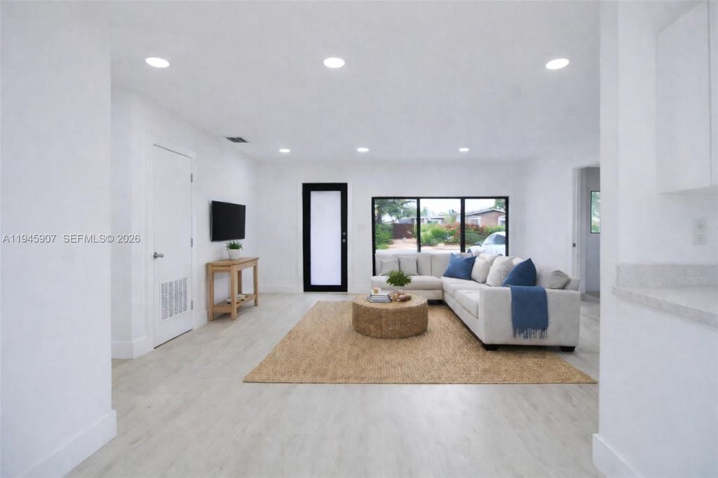 Photo of 1640 NW 27th Ave, Fort Lauderdale, FL 33311 (MLS # A11945907)