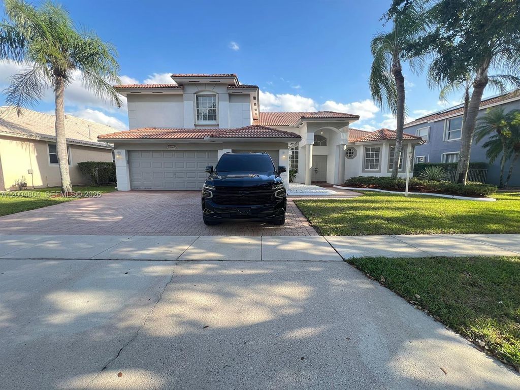 Photo of 13840 NW 20th St, Pembroke Pines, FL 33028 (MLS # A12004804)