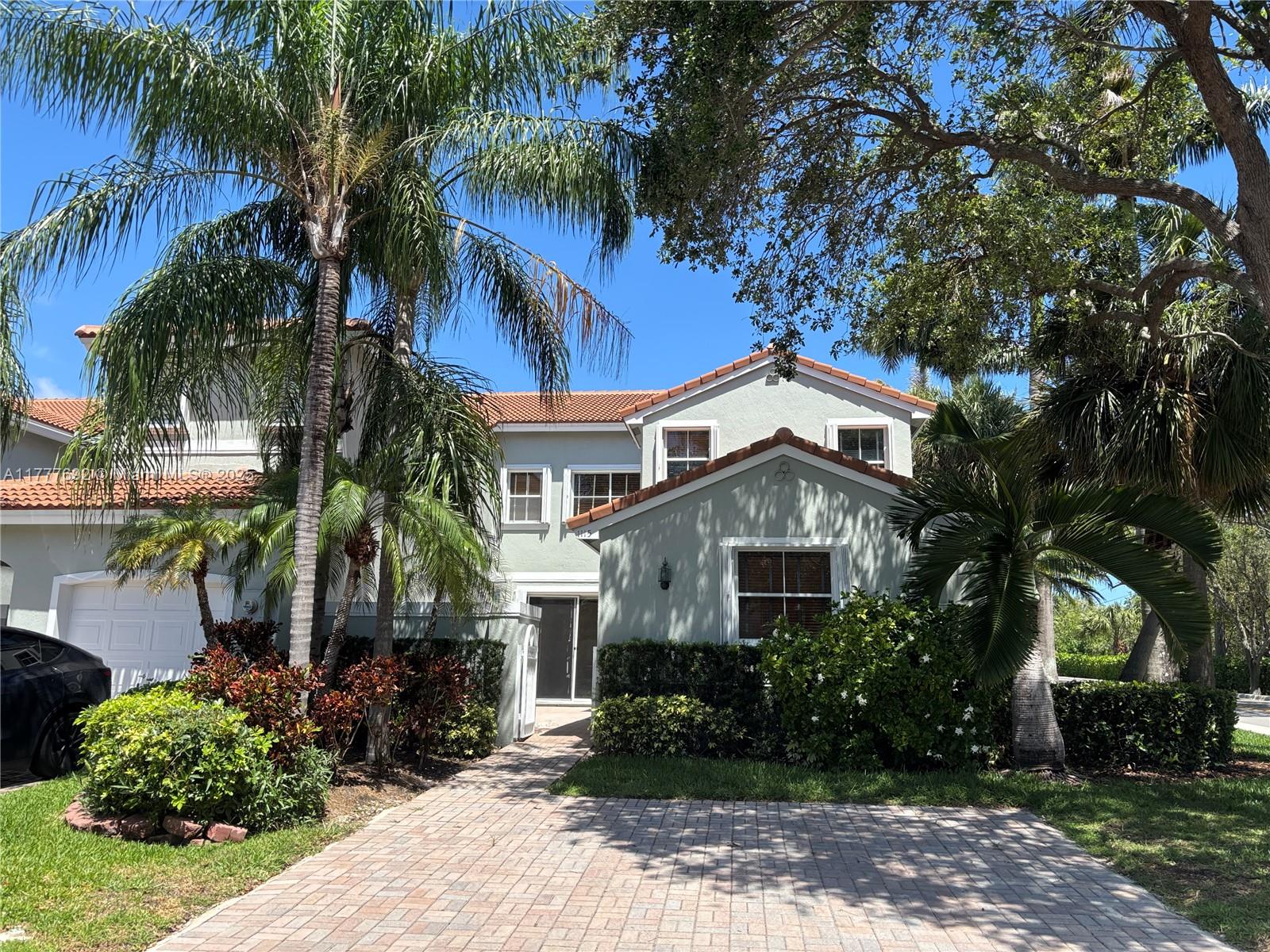 This is It, Coastal Living Move in ready updated/renovated corner 3/3 TH within the desirable West Lake Village, on a dead end St, just less then a mile to the famous Hollywood Beach Broadwalk. Enjoy your private outdoor Patio. This spacious home comes with Brazillian Wood floors. Great open concept living, open/modern style eat in Kitchen w Stainless Steel appliances. Spacious Groundfloor BR with full bath. Living space comes with Lot's of windows, light & bright. Accordeon Shutters for Hurricane Protection. The Community offers great Amenityies to their Residents. Clubhouse, a resort style headed Pool, hot Tub, Gym with new equipment, tennis, picketball, 24hr Security & so much more. Easy Accsess to all major Hyws & Airport, Shopping & Restaurants. Seller wants to Sell! Roof 2020,