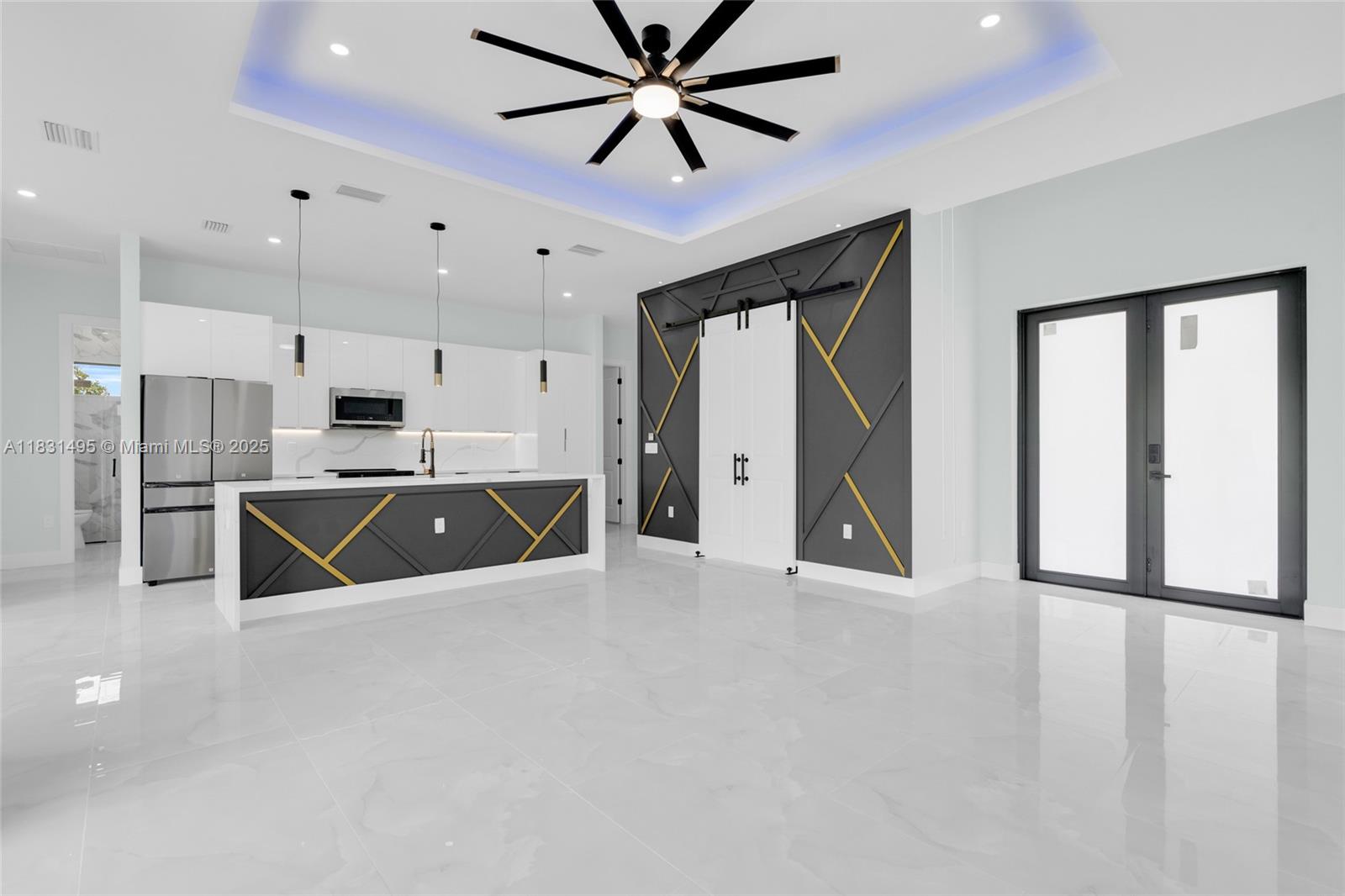 GERGOES NEW CONSTRUCTION HOME!!! Modern, elegant, and sophisticated, 3 bed + Den, 2 bath, 2 car garage. Big kitchen island, brand-modern stainless steel appliances, and calacatta quartz countertops in kitchen, baths, laundry, and outdoor kitchen. This beautiful home offers an abundance of features, including LED lighting in the entire house, custom high-gloss cabinets in the kitchen & baths. Impact-resistant doors and windows. The backyard offers plenty of room for a pool and outdoor activities, and has a great open concept with imported porcelain tile throughout. Easy access to Fort Myers, I-75, 10 minutes to RSW International Airport, shops, etc.
Sprinkler system, pavers in the driveway, and much more... This is truly the home of your dreams.