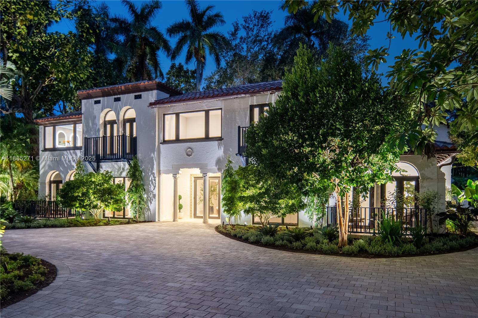 Set on a serene 21,000 sf gated estate in Coconut Grove, this Richard Kiehnel–designed Spanish Colonial home combines rich history with modern luxury. The main residence offers 5 ensuites, a living room w/ fireplace, open kitchen/dining w/ Sub-Zero/Wolf appliances & quartzite counters, wine room, laundry, and family room. The primary suite features dual walk-ins, original clawfoot tub, and two-person shower. The private guest house adds the 6th bedroom, sep. kitchen & living. Recent upgrades include new impact windows/doors, and roof w/ copper gutters. Outdoor amenities include a new pool w/ auto closer, covered patio, summer kitchen, and lush landscaping. With dual gated entrances and walking distance to top schools, this estate is a rare Grove sanctuary for elegant living & entertaining.