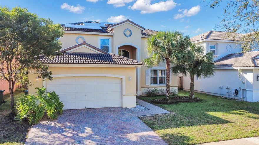 Tastefully curated 2-story residence offering 2,786 Sq.Ft. of living space in the desirable Keys Landing community. Featuring a convenient ground-level bedroom and full bath—perfect for in-laws, guests, or teens. The open-concept layout showcases tile and laminated wood flooring, a spacious family room, parlor room, and an open kitchen with stainless steel appliances and wet bar, ideal for entertaining and everyday living.

Upstairs includes 3 additional bedrooms and 2 full bathrooms, highlighted by a private primary suite featuring two walk-in closets and a spacious ensuite bath with separate shower and soaking tub, plus extra flex space in the second-floor corridor. Situated on a 5,971 Sq.Ft. lot with room for a pool. Energy-efficient solar panels help reduce electricity costs. Impact windows on the second floor and storm panels on the first provide added peace of mind. HOA includes internet and cable.

Complete with a 2-car garage, separate laundry room off the kitchen, and a prime location near parks, schools, shopping, dining, and quick access to the Florida Turnpike.
