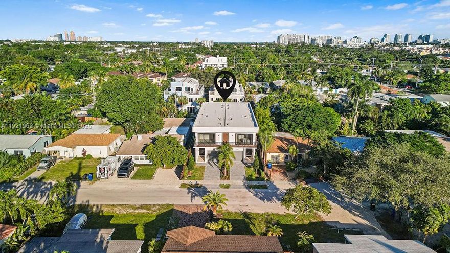 PRICE TO SELL BRAND NEW CONSTRUCTION -  Just Completed – 1222 NE 13th Ave, Fort Lauderdale TOP OF THE LINE FINISHES   Modern design meets effortless luxury in this newly finished residence featuring an open-concept layout with soaring ceilings, floor-to-ceiling impact glass, and seamless indoor–outdoor flow.    Enjoy a chef’s kitchen with European cabinetry, quartz counters, and premium appliances, plus a coffee station and dry bar for daily convenience and entertaining. The expansive primary suite offers a spa-like bathroom with a freestanding tub, walk-in rain shower, and custom double vanity.    Smart-home wired with built-in speakers throughout, this 1,583 sq ft under air home was crafted for those who appreciate design, comfort, and technology.    Move-in ready — experience modern Fort Lauderdale living today.