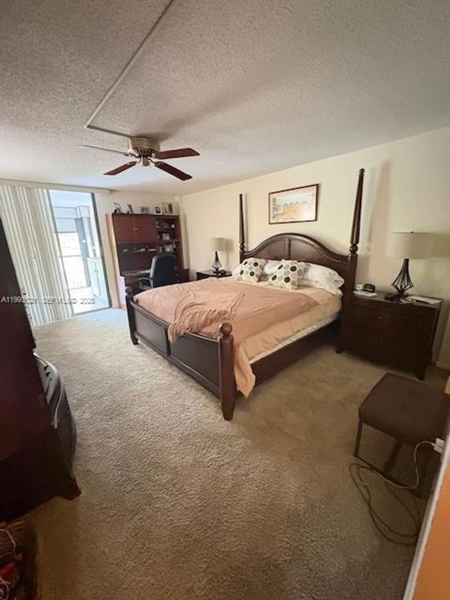 Enjoy serene west facing canal views from this spacious 1383 sq ft 2 bedroom, 2.5 bath condo, in the desirable Grandview at Emerald Hills community. Features include a large screened terrace with adjustable sun shutters for added comfort and privacy, laminate floors, a spacious primary suite with 2 walk in closets and updated bath w/double sink vanity, linen closets in both bedrooms, additional hallway storage  closet, and a separate easy access deeded storage unit. The kitchen has a newer range and refrigerator, as well as a laundry closet with full size W/D. 

Resort style ammenities include a large community pool, BBQ area, fitness center, sauna & steamrooms, renovated library, billard & ping pong rooms, as well as a 24 hr. guardhouse & roving security patrol. HOA includes, water, basic cable, internet and WIFI. Unit comes with an assigned covered parking spot. 

Conveniently located near FLL-Hollywood Int'l Airport, major highways, beaches, shopping, dining, schools & houses of worship. Don't miss this great opportunity to enjoy the fabulous South Florida  lifestyle!