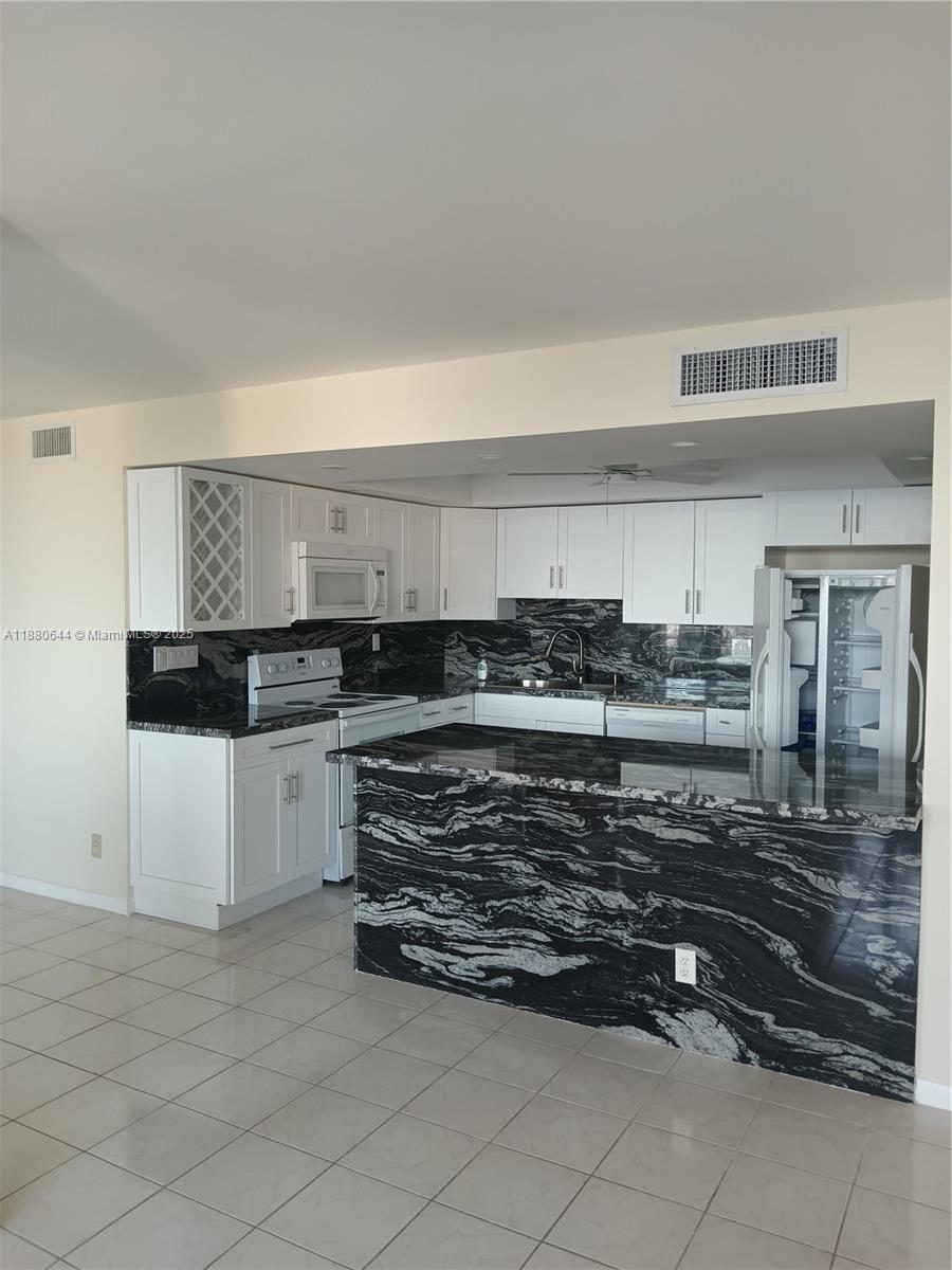 TRAFALGAR TOWERS CONDOMINI - Residential Lease