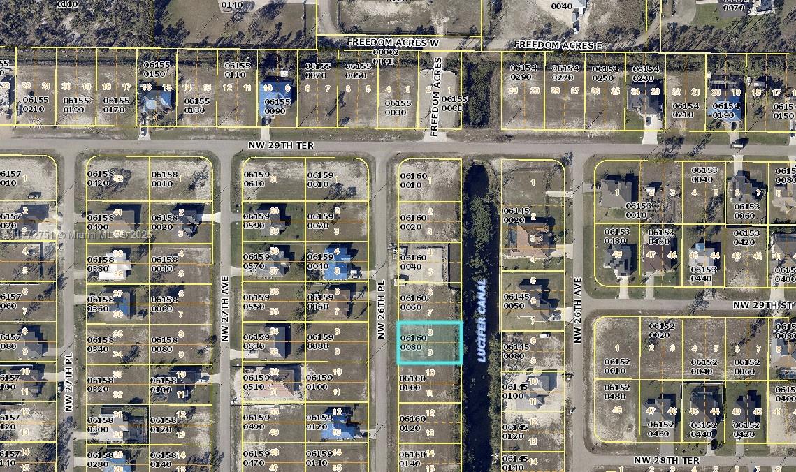Amazing opportunity to own a lot in Cape Coral with views to "Lucifer Canal". This deal won't last!