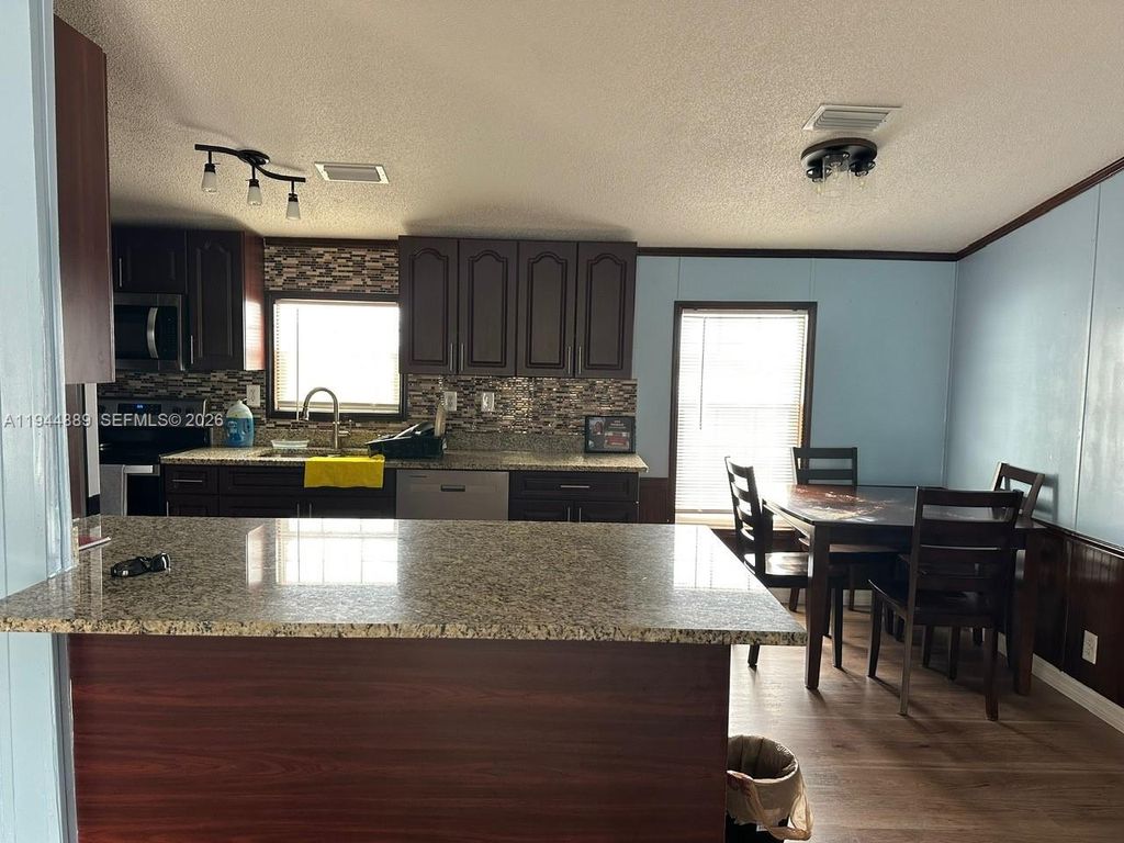 Photo of 1122 Johnson Rd, Clewiston, FL 33440 (MLS # A11944889)