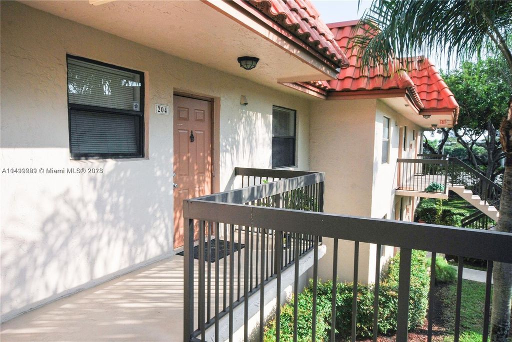 Photo of 15705 W Waterside Cir #204, Sunrise, FL 33326 (MLS # A11419289)