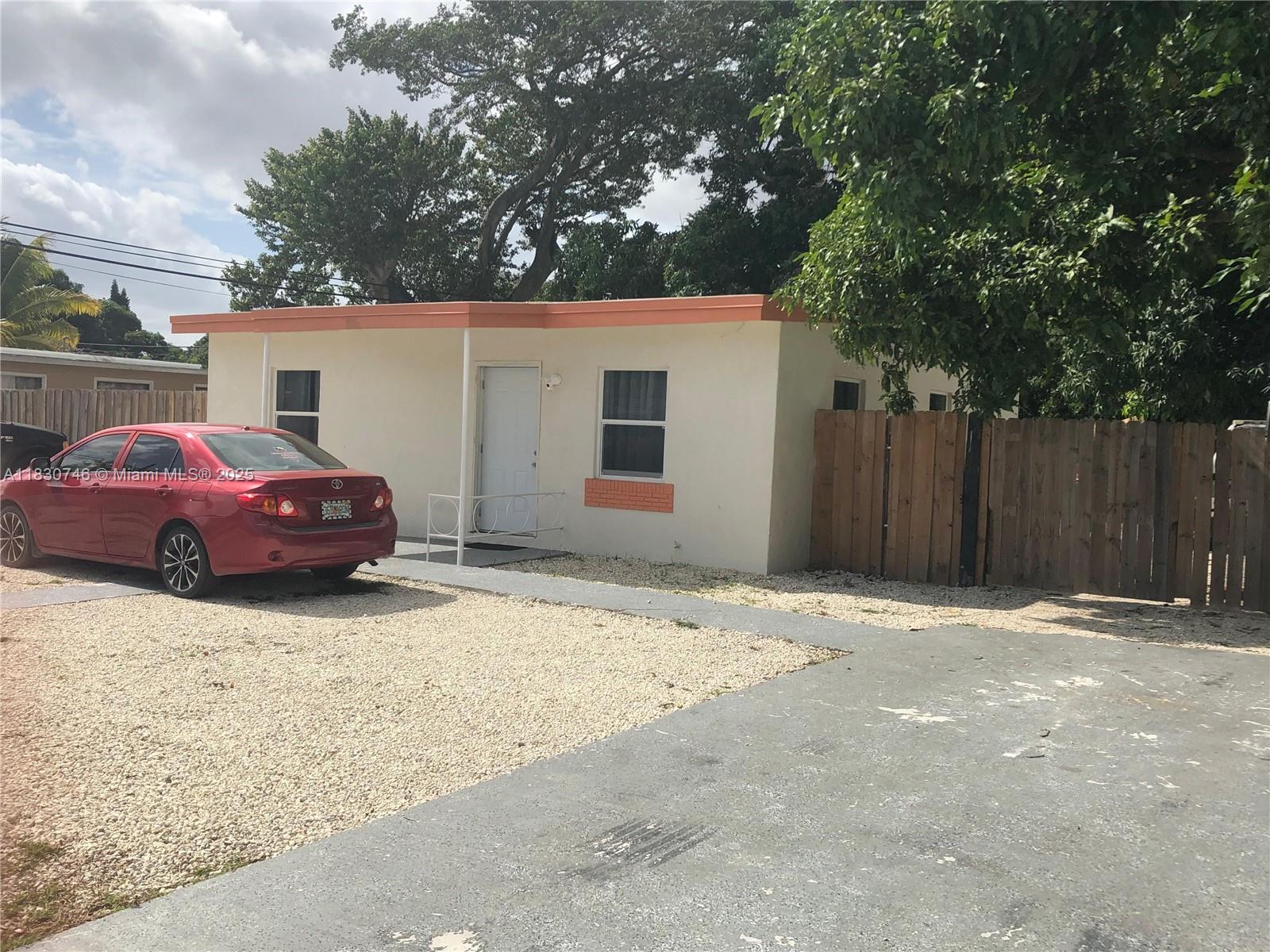 Discover this charming 2-bedroom, 1-bath single-family home nestled on an oversized 9,000+ sq ft lot in the heart of Miami Gardens. Located in the quiet Bunche Park neighborhood, this concrete block home features a functional layout, spacious backyard, and endless potential—ideal for first-time buyers or investors. No HOA, plenty of room for expansion, boat/RV parking, or even a pool. Centrally located near major highways, schools, parks, and just minutes from Hard Rock Stadium. Whether you're looking to move in, upgrade, or add to your rental portfolio, this is a fantastic opportunity at an unbeatable value.