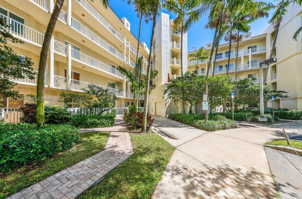 Photo of 3600 Oaks Clubhouse Dr #511, Pompano Beach, FL 33069 (MLS # A12017701)