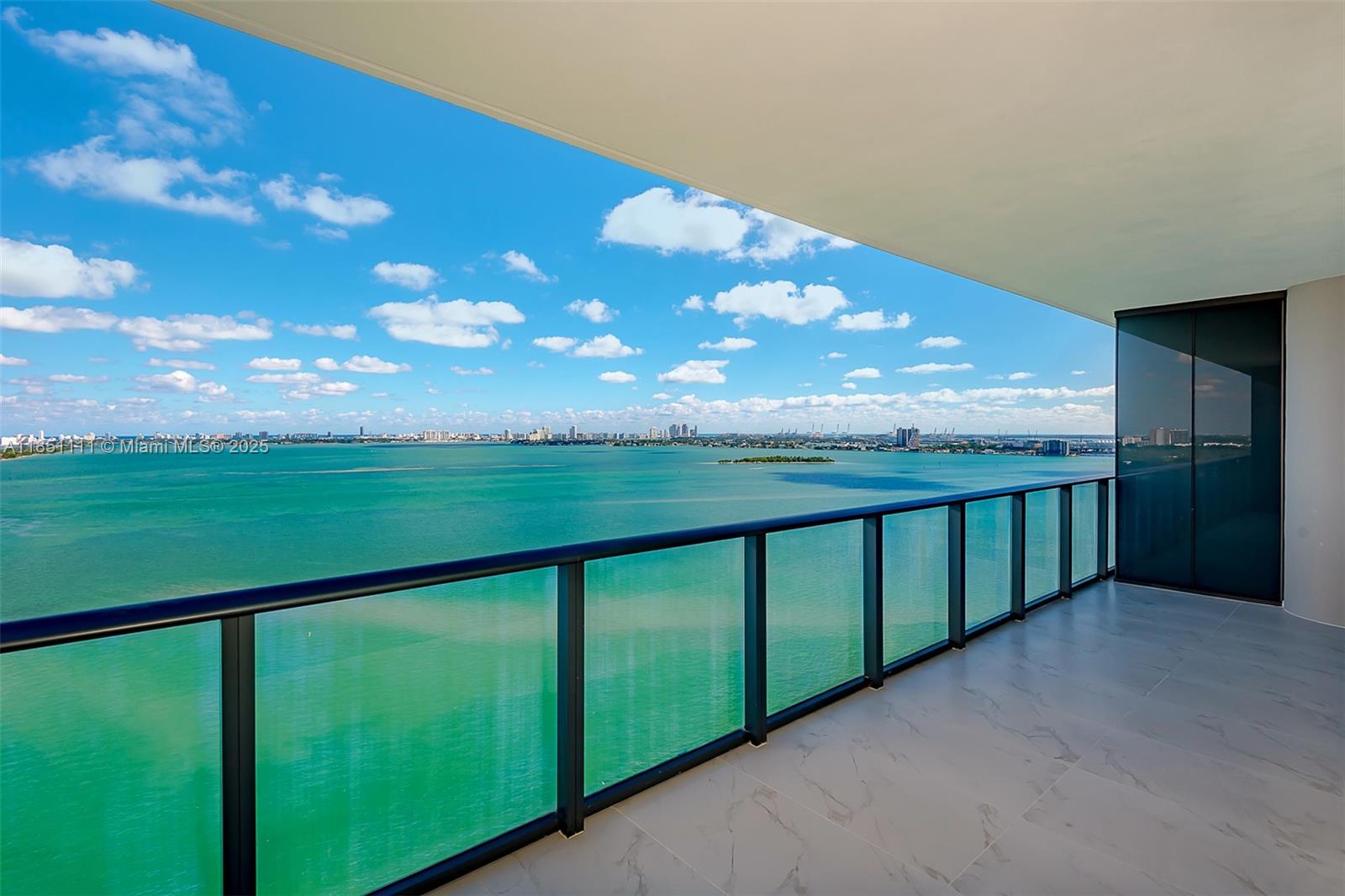 Breathtaking water vistas in this expansive open-concept condo. Floor-to-ceiling windows and vast terraces showcase the scenery. Host in style with a sophisticated kitchen featuring European cabinetry and top-notch Sub Zero/Wolf appliances. Enjoy motorized blinds, custom closets, private elevator, and deluxe amenities. 1 parking spot, and valet service. Tenant to provide a one-month rent refundable security deposit to the association. Additional storage unit included. Available to show after August 11th - ready to move in October 1st