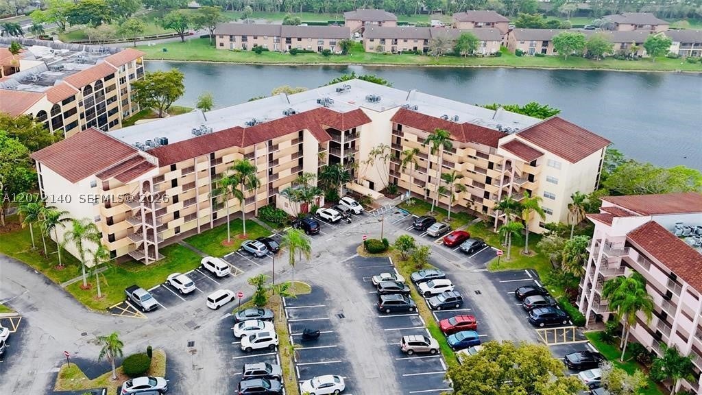 Photo of 3955 N Nob Hill Rd #403, Sunrise, FL 33351 (MLS # A12072140)