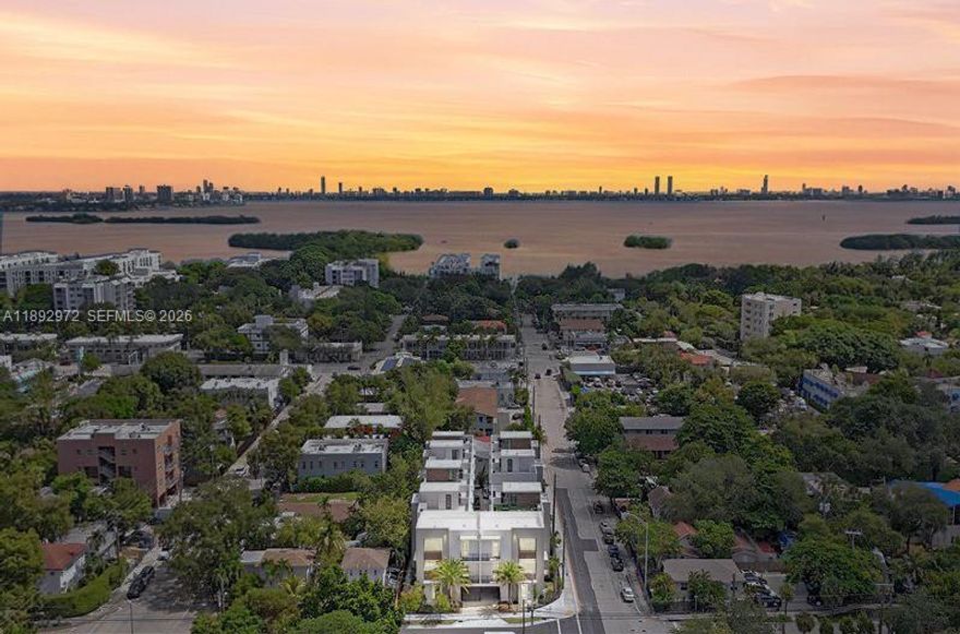 LAST CHANCE. Developer close-out at The Bennet! For the astute buyer, this brand-new, never-occupied, over 2,100 TSFT corner townhome is priced a staggering $150,000 under the recent appraised value. From the moment you pull into your private, oversized two-car garage, you'll know you've arrived. Inside, soaring 12-foot ceilings & expansive windows that fill the space with light. The meticulous, Italian-inspired luxury design boasts high-end porcelain tile, quartz counters & exquisite marble accents. A generous layout features 3 BR/3 Bath, providing ample space for work & play! Enjoy the spectacular rooftop perfect for soaking up Miami's best sunrise/sunset views. Experience world-class amenities at your doorstep with incredibly low HOA fees less than $700 / month!! Secure this exceptional value today. Please ask us about the 3-2-1 approved lender buydown. Meaning you get an interest rate as low as 3% with a monthly payment probably lower that what you're paying in rent!! Unpack & enjoy...