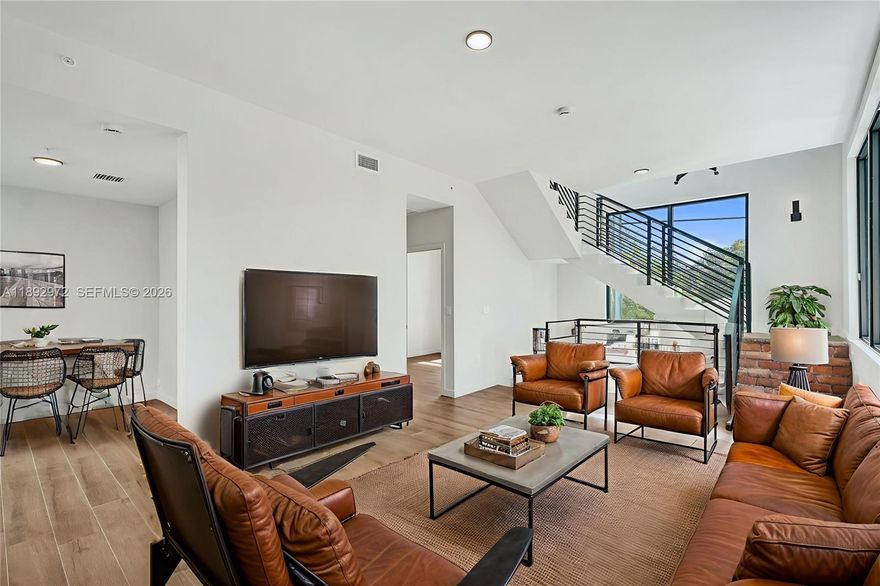 LAST CHANCE. Developer close-out at The Bennet! For the astute buyer, this brand-new, never-occupied, over 2,100 TSFT corner townhome is priced a staggering $150,000 under the recent appraised value. From the moment you pull into your private, oversized two-car garage, you'll know you've arrived. Inside, soaring 12-foot ceilings & expansive windows that fill the space with light. The meticulous, Italian-inspired luxury design boasts high-end porcelain tile, quartz counters & exquisite marble accents. A generous layout features 3 BR/3 Bath, providing ample space for work & play! Enjoy the spectacular rooftop perfect for soaking up Miami's best sunrise/sunset views. Experience world-class amenities at your doorstep with incredibly low HOA fees less than $700 / month!! Secure this exceptional value today. Please ask us about the 3-2-1 approved lender buydown. Meaning you get an interest rate as low as 3% with a monthly payment probably lower that what you're paying in rent!! Unpack & enjoy...