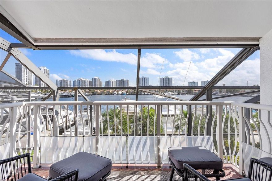 Rare Opportunity in Portsview Townhomes, Aventura! This spacious 2,396 sq. ft. residence offers stunning marina views from both the living room and primary suite. Features include updated bathrooms, closets, and a serene patio overlooking the water. Located in a secure gated community, residents enjoy heated pools, tennis courts, guest parking, and more. Just minutes from Aventura Mall, the beaches, dining, and entertainment. Potential boat dockage is available for rent or purchase at the community marina.