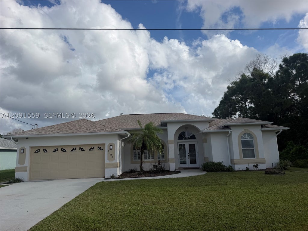 Photo of 6122 NW Daroco Ter, Port St Lucie, FL 34986 (MLS # A12091559)