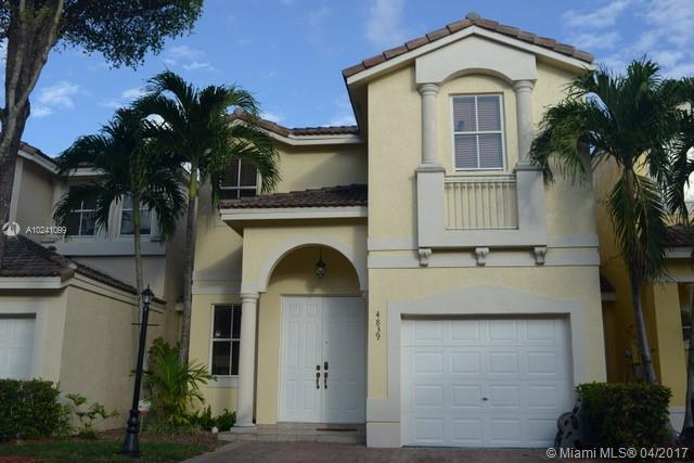 BEAUTIFUL TOWNHOUSE AT DORAL, IN AN AMAZINGLY LOCATED GATED COMMUNITY COSTA BRAVA. VERY WELL MAINTAINED 4 BED, 2.5 BATH. WASHER AND DRYER, REMODELED KITCHEN WITH STAINLESS STEEL APPLIANCES, LAMINATE WOOD FLOORING ON SECOND FLOOR, AND WOOD CLOSETS IN ALL 4 BEDROOMS. COZY TILED BACKYARD, FENCE PATIO, PERFECT FOR A GREAT BBQ. CONVENIENTLY LOCATED NEAR GREAT SCHOOLS, SHOPPING AREA, AND MIAMI DADE COLLEGE.