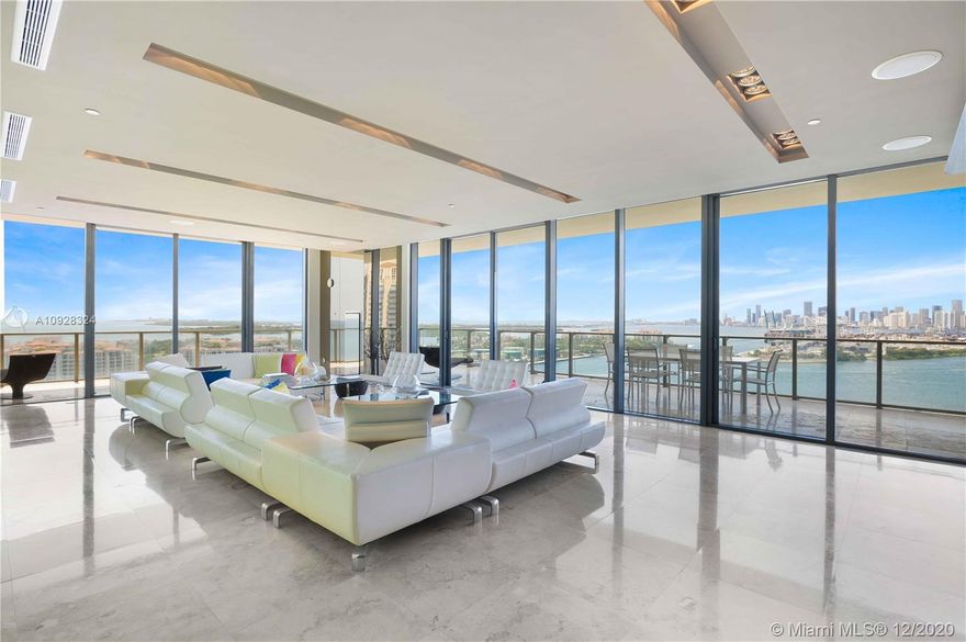 Welcome to one of the most coveted luxury high rise buildings in Miami Beach...Apogee! This unit was featured on the cover of Home Design magazine, as one of the most eclectic design styles you'll find at Apogee or quite possibly, in all of Miami! 4154 sf of opulent living space! Just 2 floors below the penthouse, you'll have breathtaking views of the bay & ocean, Miami, South Beach, Fisher Island and Port of Miami. French architect and interior designer, Michel Gamard, was instrumental in bringing this unit to life. The interior features over 19 specially selected colors, which highlight the art deco & vibe of world-renowned South Beach. Other features: private movie room, en suite bedrooms, home automation system and a climate controlled two-car garage with an abundance of storage room!