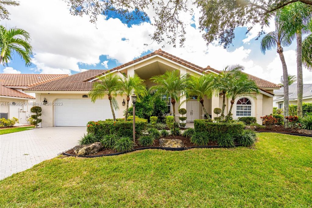 Photo of 10628 NW 49th Ct, Coral Springs, FL 33076 (MLS # A11478065)