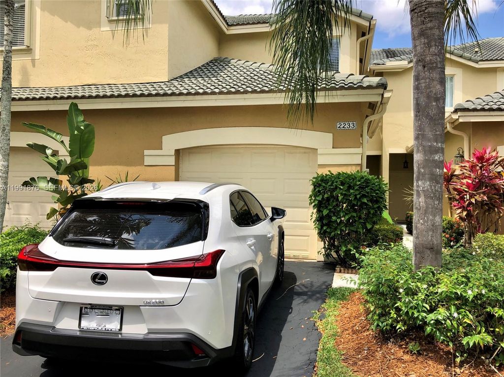 Photo of 2233 Ensenada Ter, Weston, FL 33327 (MLS # A11991876)