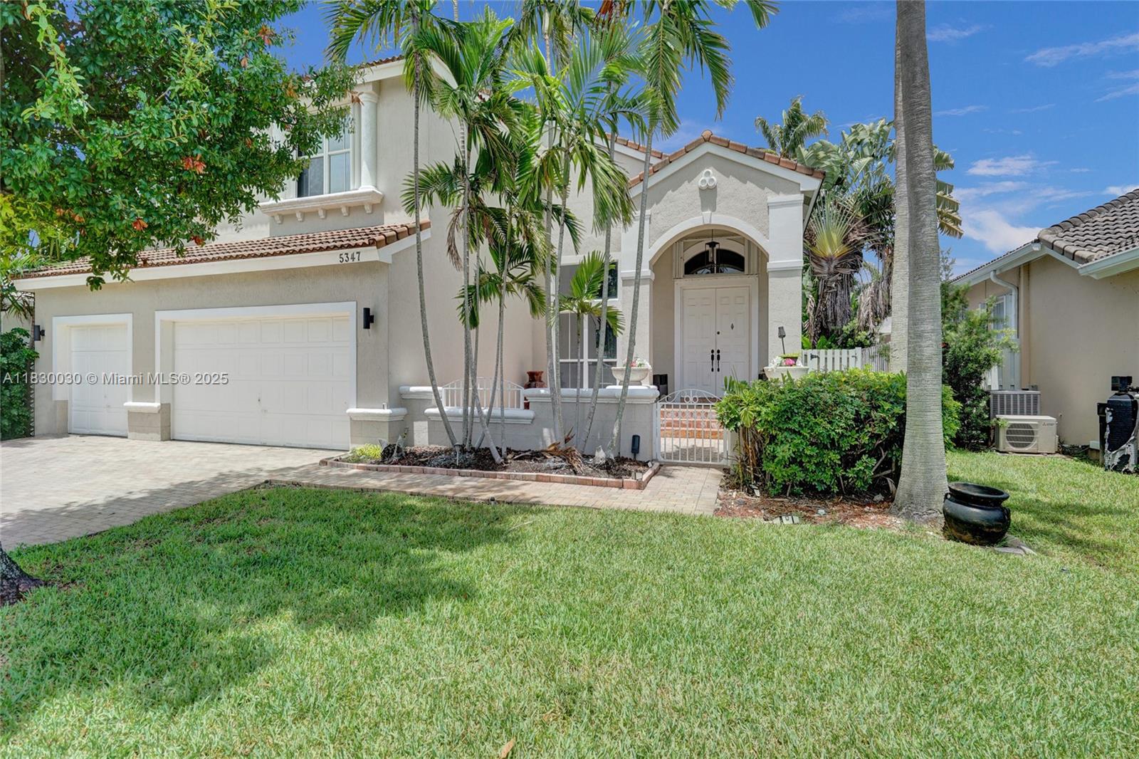 Welcome to this beautifully upgraded 6-bed,3-bath The WILOW Model home, located in the highly desirable gated community of OAKRIDGE .spacious residence is move-in ready and perfect for both family living and entertaining.Enjoy the spacious layout, modern and the comfort of living in one of the most sought-after neighborhoods.This is truly a home where style meets function,Features include Newer A/C new water heater,Renovated bathrooms & laminate flooring throughout ,sparkling pool with new diamond-bright finish and skimmer,Electric vehicle charging Ready,Converted third garage currently used as a gym (can be easily converted back) Accordion Hurricane Shutter in the 2nd floor, Large backyard with a pergola & plenty of space to lounge or entertain, community with tennis courts and a tot lot