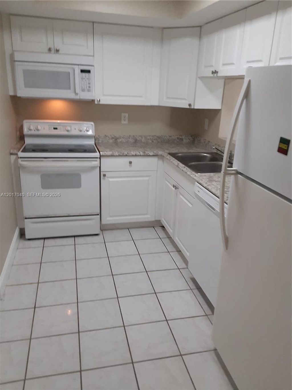 Photo of 2713 NW 47th Ter #504, Lauderdale Lakes, FL 33313 (MLS # A12017040)