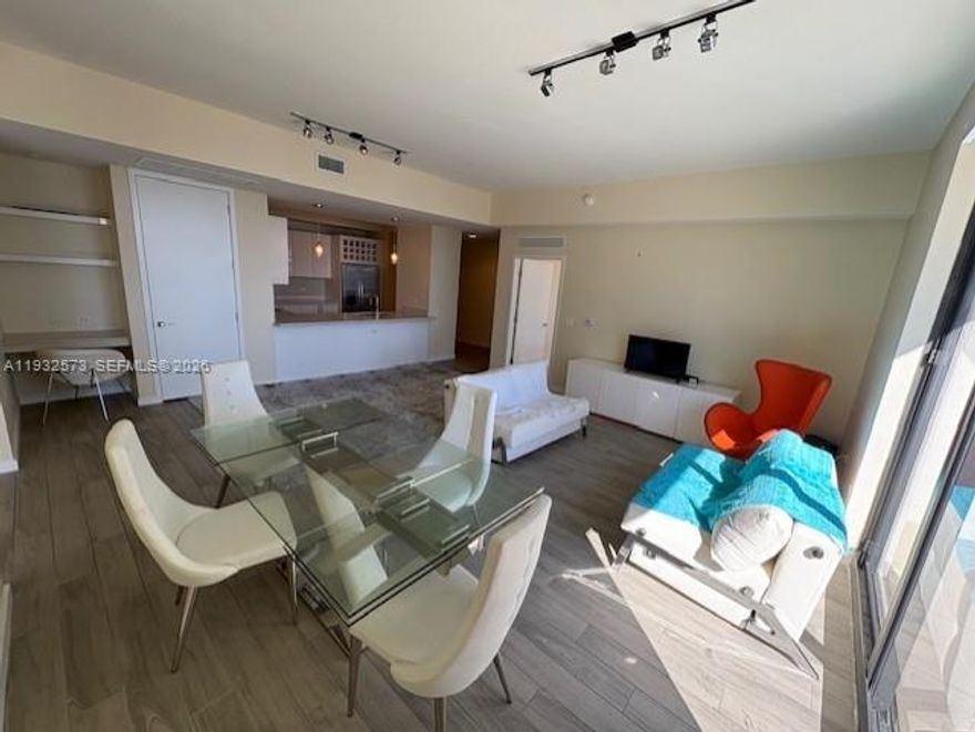 Beautifully furnished penthouse with water view and large balcony. Come to see this unit with spacious balcony and open floor plan. Washer and dryer at the unit. Modern layout. Amazing location on top of Publix and Mary Brickell Village. Two parking spaces. Easy to show.