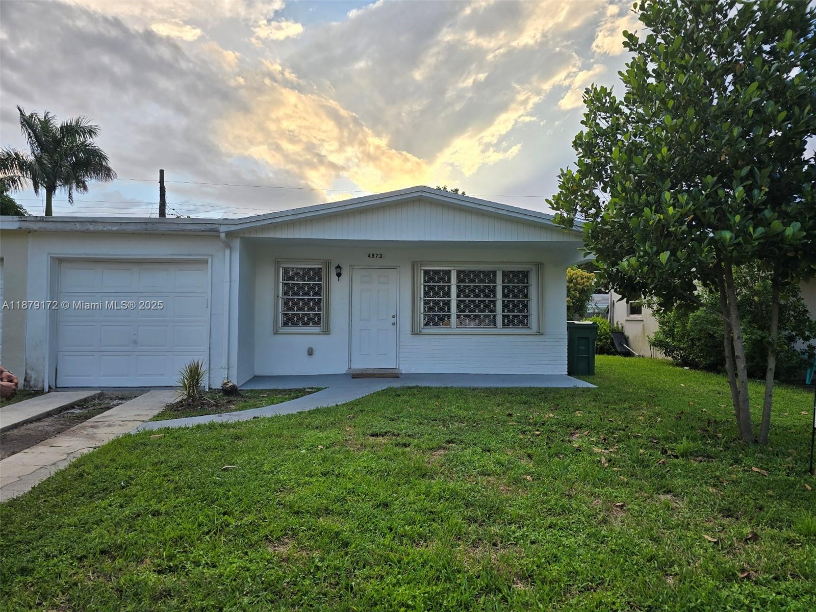 Welcome to this beautifully updated 2-bedroom, 1-bathroom home nestled in one of Cooper City's most sought-after family-friendly neighborhoods. This move-in-ready unit features a spacious layout with brand new flooring, granite countertops, and an updated kitchen equipped with a new refrigerator and cooking range, New A/C unit, New water heater, and energy-efficient accordion shutters throughout. The recently renovated bathroom and new zebra blinds, fresh interior paint add style and warmth to every room. A private backyard perfect for entertaining or relaxing in your own space. Located just a short walk from top-rated A+ Cooper City schools, this home is ideal for families looking for a safe & welcoming community.