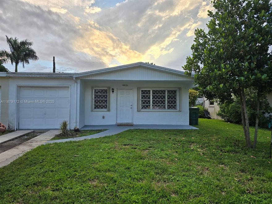 Welcome to this beautifully updated 2-bedroom, 1-bathroom with 1 Car Garage home nestled in one of Cooper City's most sought-after family-friendly neighborhoods. This move-in-ready unit features a spacious layout with brand new flooring,  granite countertops, and an updated kitchen equipped with a new refrigerator and cooking range, New A/C unit, New water heater, and energy-efficient accordion shutters throughout. The recently renovated bathroom and new zebra blinds, fresh interior paint add style and warmth to every room. A private backyard perfect for entertaining or relaxing in your own space. Located just a short walk from top-rated A+ Cooper City schools, this home is ideal for families looking for a safe & welcoming community.