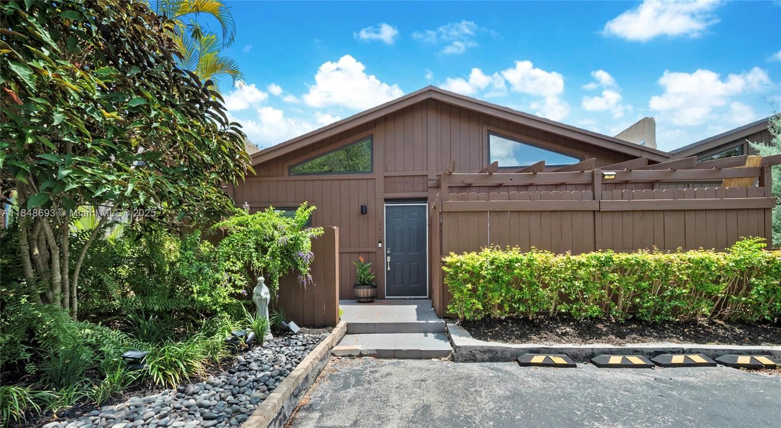 Beautifully updated 2-bedroom, 2-bath lot & block townhouse in the highly desirable Killian Pines community. This home features high ceilings, spacious bedrooms, and elegant porcelain tile flooring throughout the living area. The kitchen includes newer appliances and a gas stove. The home is also equipped with a tankless water heater for added energy and space efficiency. Enjoy a large private backyard, a 2-car private driveway, and a low HOA fee of just $69/month. The roof was replaced in 2017, the AC is from 2016, and some windows have been upgraded to impact. Centrally located near top-rated schools, shopping, and major highways. Conventional, FHA, and VA financing welcome!
