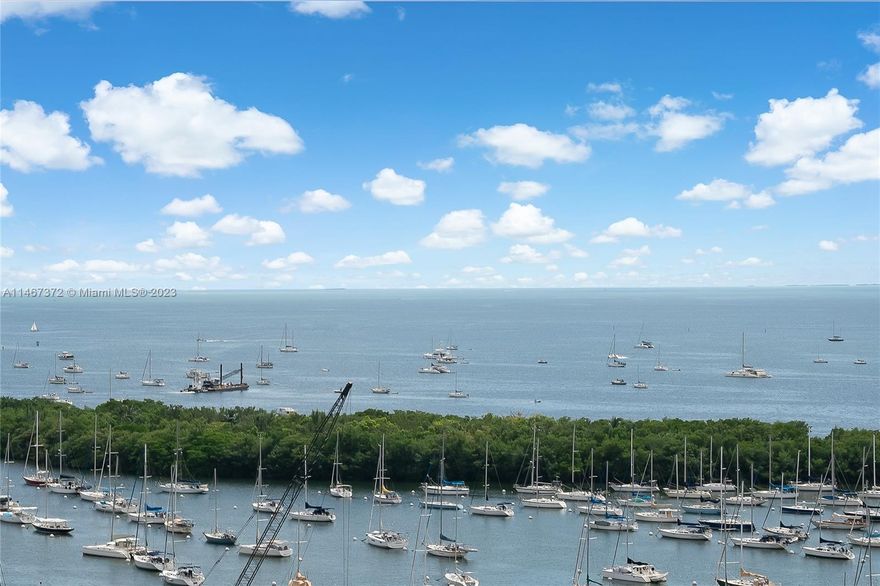 Unmatched Luxury Living: Stunning '02' Line with Direct Bay Views and 10ft Ceilings. This exquisite 2 bedroom/2 bathroom plus den unit at Park Grove Residences, is not just a home but a lavish lifestyle. Professionally custom-designed and decorated. Exclusive rooftop pool for Club Residence residents. 550 feet of pools, lush landscaping, gym, spa, cinema, wine room, and concierge. Steps from Coconut Grove's heart. Don't miss this gem!