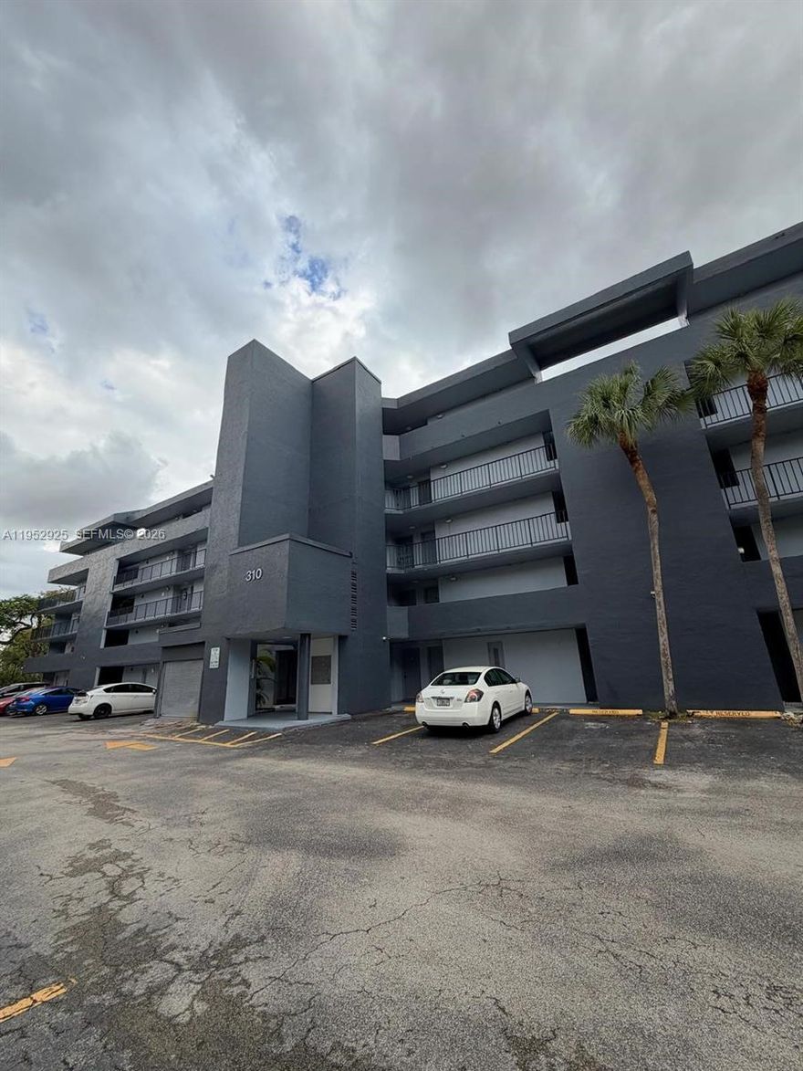 2 bedroom, 1.5 bath residence offering approximately 900 sq. ft. of comfortable living in the highly central Greens Condo Community.  This well designed unit features an open living and dining area, and abundant natural light throughout.  Enjoy the convenience of in-unit laundry, a new A/C unit (2024), and HOA fees that include water.  The property comes with 2 reserved parking spaces, plus guest parking.  Ideally located near major highways, shopping centers, dining, schools, and public transportation, makes this unit an excellent option for owner occupants and investors alike.  Low maintenance living in an established community with easy access to everything Miami has to offer.  This is an excellent opportunity so schedule your appointment today!