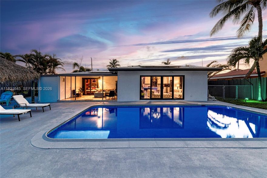 Discover a one-of-a-kind custom home in Garden Isles, where artistic design meets
upscale living. This beautifully reimagined residence offers 80’ of seawall with a
stunning view of a wide ocean-access canal, the perfect backdrop for
entertaining or relaxing in style. Extensively remodeled, this home features open
wood vaulted ceilings, large porcelain floors, an interior water wall, custom
German cabinets, deep blue semi-precious agate countertops, impact windows and
doors,2 outdoor living and dining areas, a heated pool, and a fully-owned, new
13.6kW solar system with a Tesla house-backup battery. The outdoors boast a
large tropical tiki hut, an expansive pool deck and open backyard, and a new 80’
custom dock.Close to shopping ,dining and 8 brand-new pickleball courts at Sgt. Kip Jacoby Park.
Bring your boat and family to live the ultimate Florida lifestyle.