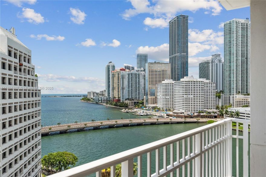 Discover this spacious 2-bedroom, 2-bathroom residence featuring incredible double exposure with stunning views of both the bay and the city from every room. The unit offers an ideal split floor plan, continuous marble floors, and has been freshly painted. The modern kitchen is equipped with white cabinetry and a quartz countertop. Additional features include walk-in closets and new blackout shades on all windows and doors. Enjoy this central location, which offers easy access to the island's walking paths and playgrounds. The property provides convenient access to main roads and is situated close to Brickell City Center, restaurants, entertainment, banking, shopping, and more.