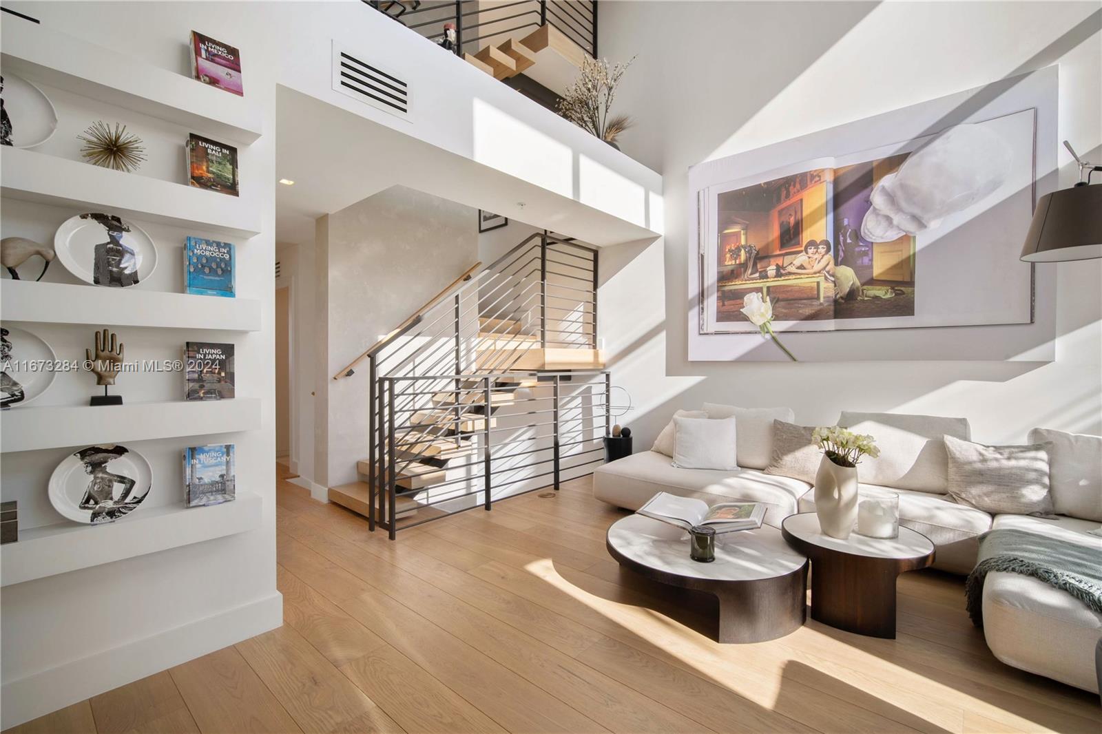 Built in 2020, Stunning 3 bedrooms, 3.5 bathrooms designed and decorated by interior designer. 4 story townhouse in Miami Beach featuring 2 car garage, private elevator with access to all floors, large rooftop terrace w/ summer kitchen. Flos lighting throughout, motorized window treatments & speakers automated and operated with Crestron smart home system. Soaring 20-foot ceilings in living area, modern European kitchen,top-of-the-line Sub-Zero & Wolf appliances. Gas cooktop & marble backsplash, 8-1/4” Italian white oak flooring throughout. Spacious master bathroom with soaking tub & steam shower. Full-size laundry room & large walk-in custom closets. Impact windows & doors. Complex has a beautiful waterfront pool. Unit is offered unfurnished, select furniture is available for sale.