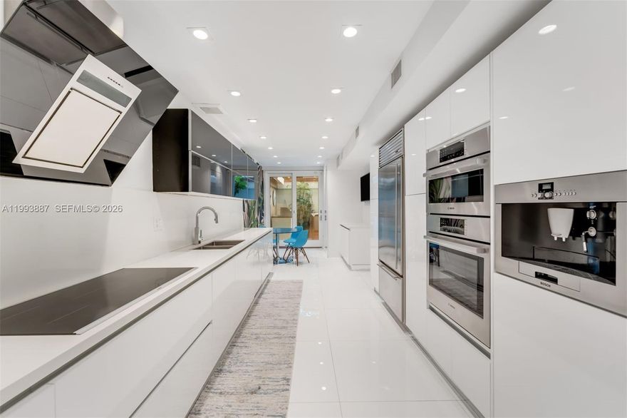 Stunning, fully renovated 3-story townhouse in the exclusive, guard-gated Quayside community. This 3-bedroom, 3.5-bath residence features a private elevator, impact windows, and an impressive master suite with soaring 20-foot vaulted ceilings. Every detail has been thoughtfully updated, offering a perfect blend of luxury and comfort. Enjoy resort-style living with access to 32 acres of lush grounds, two on-site restaurants, tennis courts, a full-service gym/spa, marina, and endless amenities. A rare opportunity in one of Miami’s most secure and amenity-rich communities.