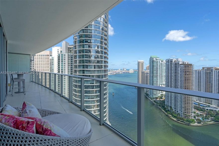 Experience elevated living in this stunning 2 bedroom, 2.5 baths residence with a functional den at Epic Building. This impeccably maintained home offers a modern, clean design with spacious interiors and an ideal layout. Floor-to-ceiling glass fills the residence with natural light while showcasing breathtaking, unobstructed views of Biscayne Bay and the Miami skyline. The open-concept living and dining areas flow seamlessly to a private balcony, creating the perfect setting to enjoy amazing views. The sleek kitchen is complemented by quality finishes, while both bedrooms offer en-suite bathrooms for maximum comfort and privacy. The den provides a versatile space ideal for a home office or guest area. Residents enjoy world-class amenities including resort-style pools, a full-service spa, state-of-the-art fitness center, 24-hour concierge, valet, and exclusive access to renowned on-site dining such as Zuma Miami and Area 31. Ideally located in the heart of Downtown Miami, just minutes from Brickell, Whole Foods, Bayfront Park, and Brickell City Centre, this residence offers the perfect blend of luxury, convenience, and lifestyle.