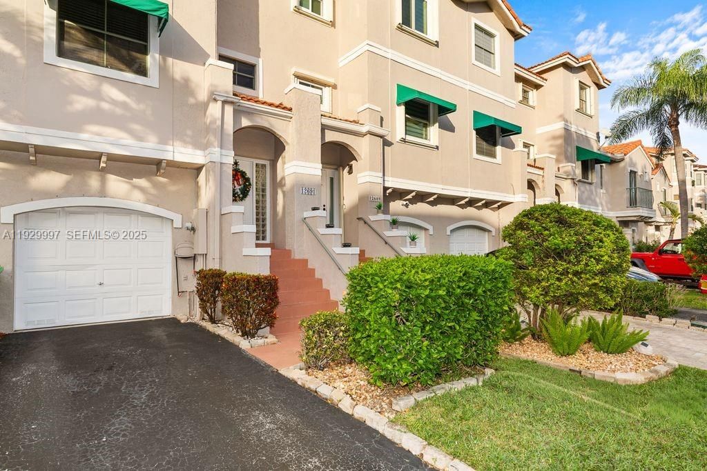 Photo of 12691 NW 14th Pl, Sunrise, FL 33323 (MLS # A11929997)