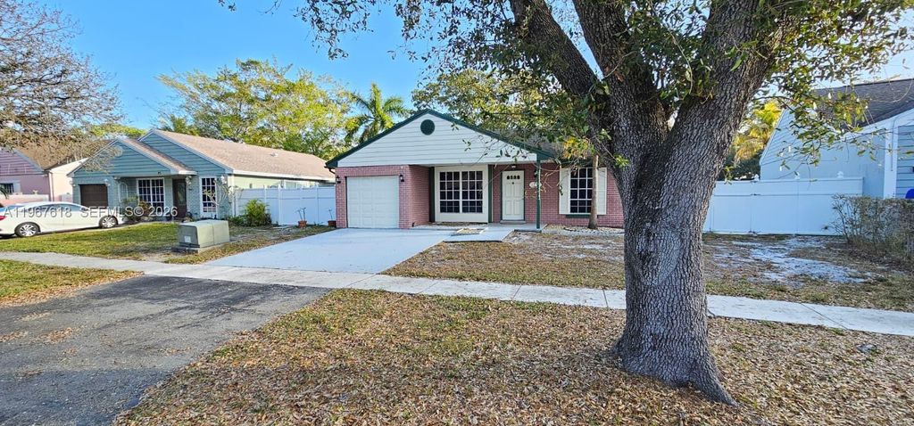 Photo of 1251 SW 84th Ter, Pembroke Pines, FL 33025 (MLS # A11967618)