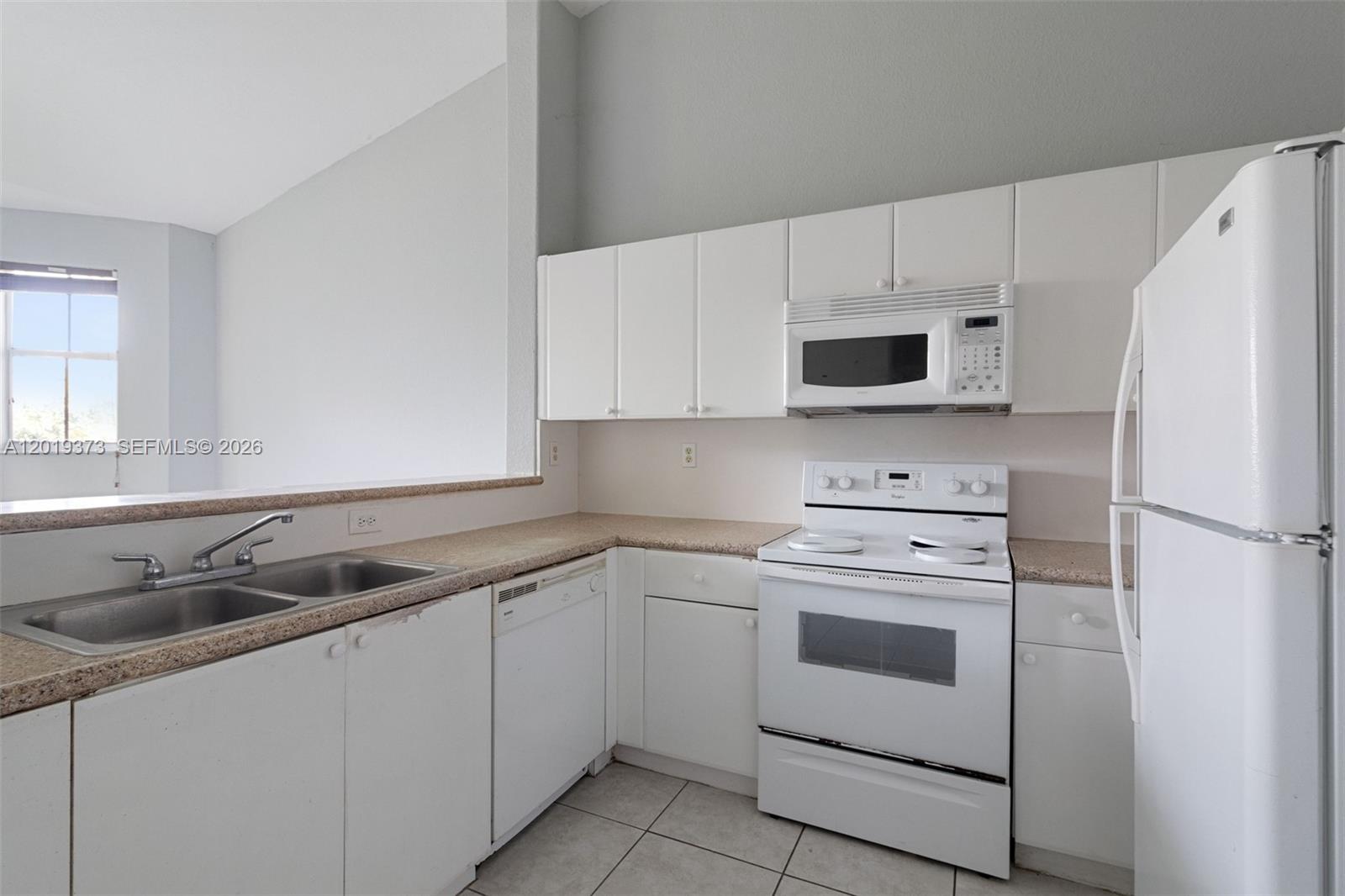 1568 SE 26th St 203