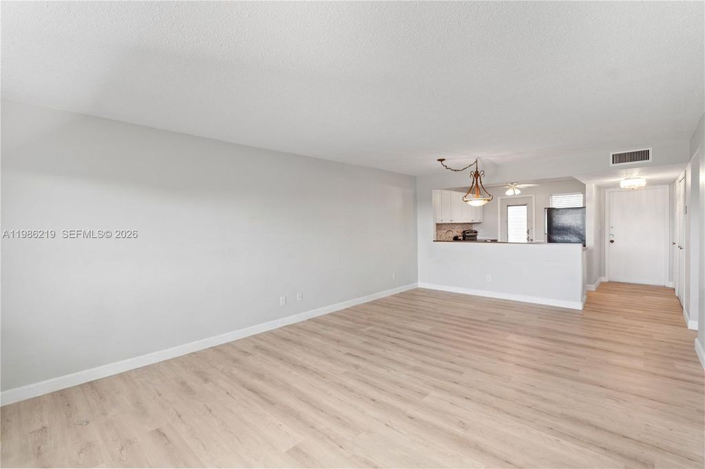 Photo of 4800 Hillcrest Ln #408, Hollywood, FL 33021 (MLS # A11986219)