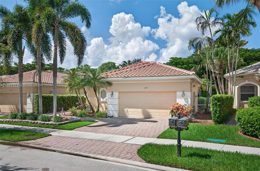 Exquisite 3-bedroom, 3-bath one-story home in the exclusive Bay Isle at Weston Hills Country Club. This residence features soaring ceilings, open living spaces and a remodeled kitchen with premium finishes. Enjoy peace of mind with a brand-new roof and impact windows. The primary suite overlooks the sparkling pool with travertine deck and lush landscaping. Elegant marble floors in living areas and wood-look floors in bedrooms. Bathrooms have been fully renovated with high-end fixtures. Weston Hills offers a guard-gated lifestyle with manicured grounds, parks, playgrounds, and optional Club memberships for golf, tennis and social activities. Top-rated schools complete this exceptional offering. Property Available on 01/15/26