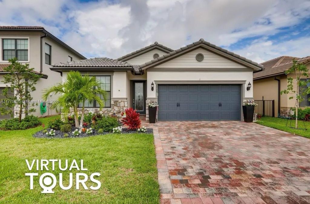 Photo of 4933 Exmoor St, Lake Worth, FL 33467 (MLS # A11775026)