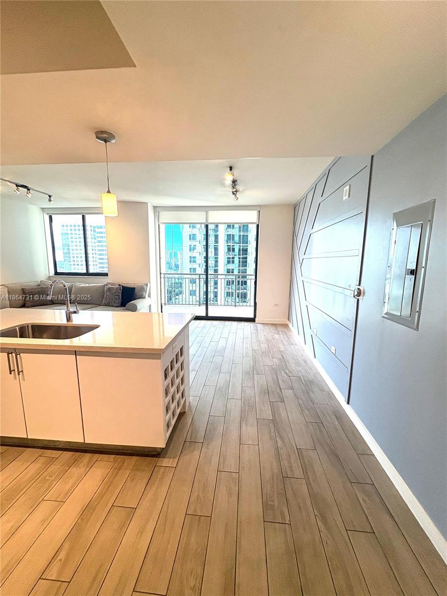 Discover vibrant city living at Nine at Mary Brickell Village, a full-service building with resort-style amenities. Relax on the 11th-floor deck featuring a pool, cabanas, gym, library, lounge, game room, kids play area, dog run, grilling and lounge pavilion, and 24-hour security. This 1-bedroom, 1-bath condo offers 914 sq ft with north-facing city views, tile floors, carpeted bedroom, spacious walk-in closet, and Whirlpool stainless steel appliances. One assigned parking space plus optional second for lease. Nine Mary Brickell Village is in a prime Brickell location near dining, shopping, transit, and The Underline. Easy to show!