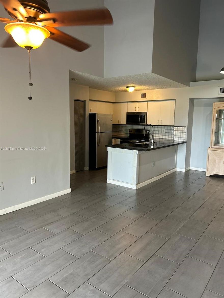 TOP FLOOR UNIT WITH VAULTED CEILING.SPLIT FLOORPLAN WITH TWO MASTER SUITES-WALK IN CLOSETS AND
PRIVATE BATHS. FRESHLY PAINTED WITH NEUTRAL COLORS. UPDATED KITCHEN WITH GRANITE COUNTERS,
GLASS TILE BACKSPLASH.STAINLESS STEEL APPLIANCES MODERN TILE THROUGHOUT THE UNIT OPEN BALCONY
GARDEN AND CANAL,. GATED COMMUNITY CONVENIENTLY LOCATED. EASY ACCESS TO I-95 NEAR CITY PLACE,
DOWNTOWN AND LOTS OF RESTURANTS, COMMUNITY HAS POOL HOT TUB TENNIS AND FITNESS ROOM.