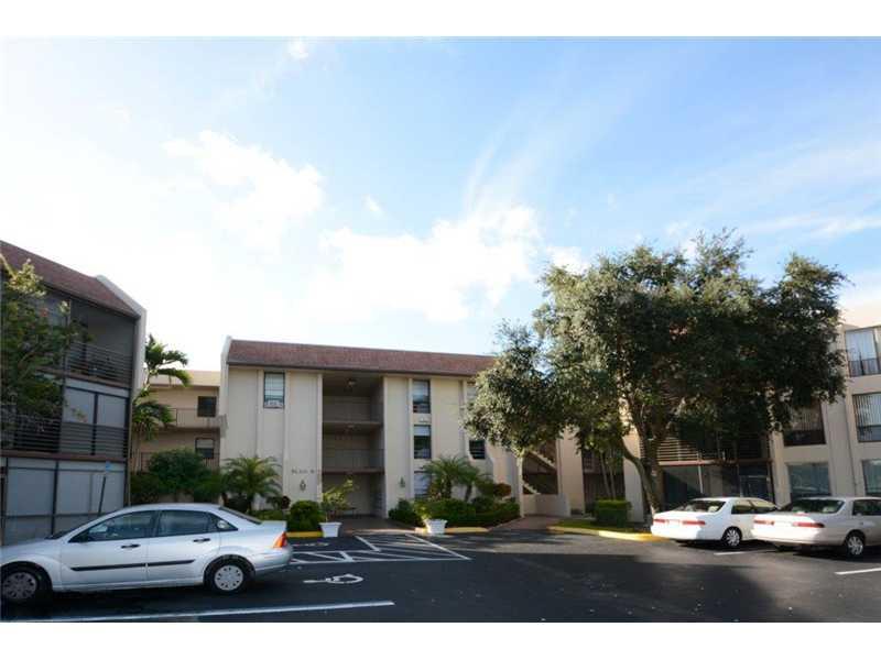 Beautiful golf view from this 2/2 in Concord Village! Property is all ages and features ceramic tile and wood floors, new a/c (2013), washer/dryer hookup, screened patio and so much more. Amenities include clubhouse, three pools, exercise room, etc. Leasi ng is not allowed. 25% down required if financed. Make us an offer today!
