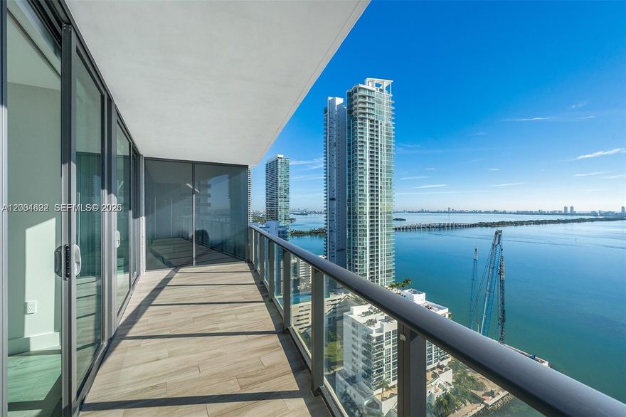 Designer-inspired 2 bed, 2 bath residence at Icon Bay with stunning direct bay views. This thoughtfully curated home features Italian porcelain floors, custom closets, window treatments, designer lighting fixtures, and elegant wallpaper in the private foyer. Enjoy refined living with an open-concept layout and upscale finishes throughout. One assigned parking space included. Icon Bay offers five-star amenities including a state-of-the-art fitness center, waterfront pool, valet service, and more. Located just minutes from the Miami Design District, shopping, dining, and nightlife. Contact us today for more information and to schedule a private showing. FOR SHOWINGS CHECK BROKER REMARKS.