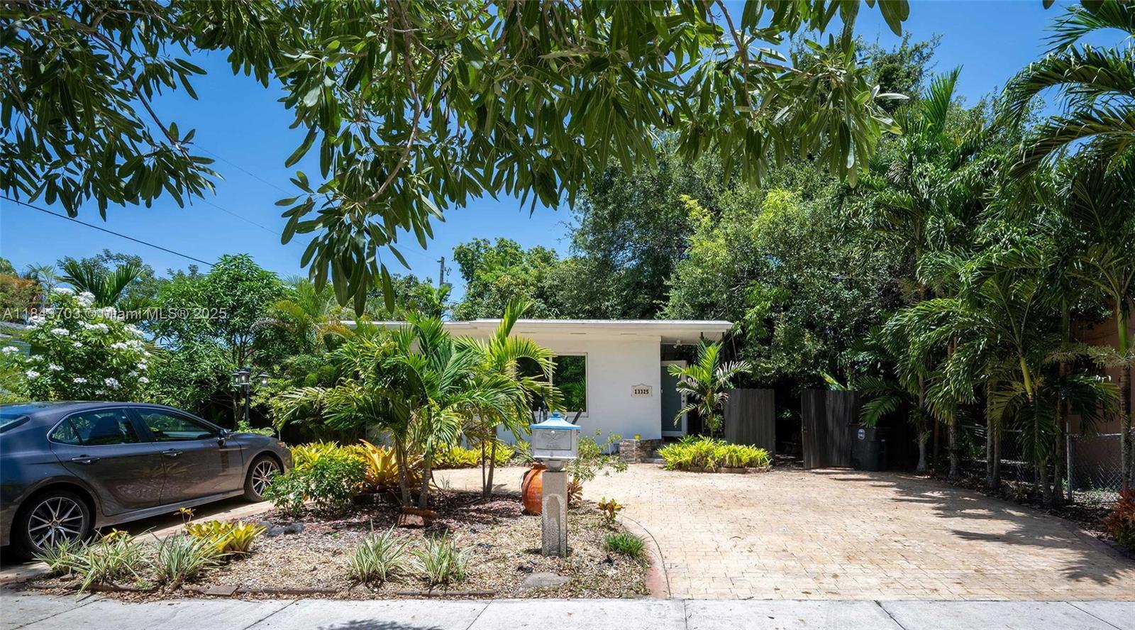 THIS IS A VERY COZY AND CHARMING HOUSE IN THE HEART OF NORTH MIAMI. IT OFFERS: FIVE YEARS OLD ROOF, REMODELED KITCHEN, IMPACT WINDOWS, CEILING FANS, CIRCULAR DRIVEWAY, BEAUTIFUL LANDSCAPING, A GREAT AND LARGE COVERED PATIO WITH A BUILT-IN MASONRY GRILL / BARBECUE, PLUS TREES, PLANTS, FLOWERS, AND TWO CEILING FANS, PERFECT FOR ENTERTAINMENT. ALSO A SHED FOR SOTAGE, AND MORE. PROPERTY LOCATED IN A BIRD SANTUARY NEIGHBORHOOD. PLEASE CONTACT L.A. FOR SHOWING INSTRUCTIONS. SELLER MOTIVATED!